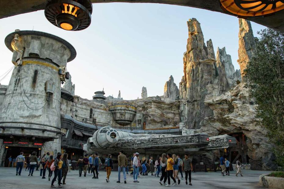 Guests gathered in front of Millennium Falcon: Smuggler’s Run in Star Wars: Galaxy’s Edge at Disneyland Resort in California. (Disney / Lucasfilm)