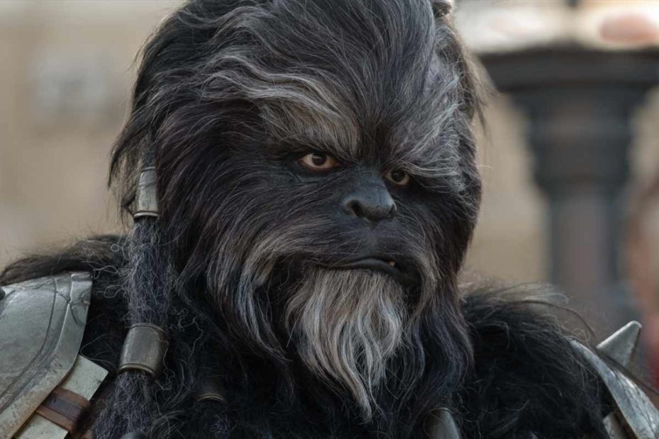 Actor Carey Jones as Wookiee bounty hunter Krrsantan from the Star Wars Disney+ series The Book of Boba Fett